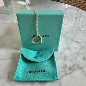 Tiffany & Co Elsa Peretti open heart necklace.